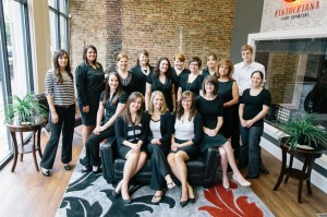 Louisville Court Reporters group photo in the lobby of the Louisville office