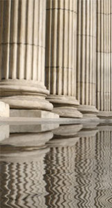 stone columns and their reflections in water